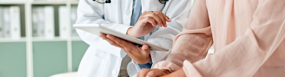 A doctor talking to a patient.