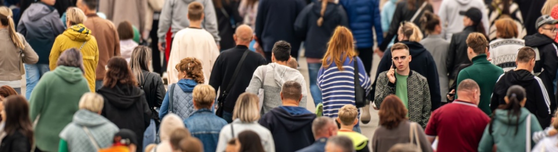 A crowd of people walking.