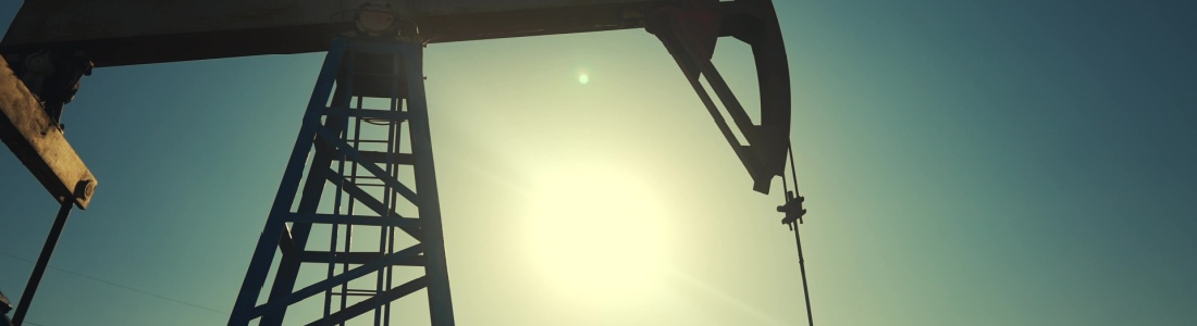 A silhouette of an oil pump.